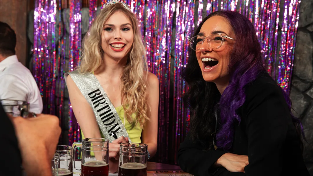 Guests celebrating at a Salt Lake City murder mystery party